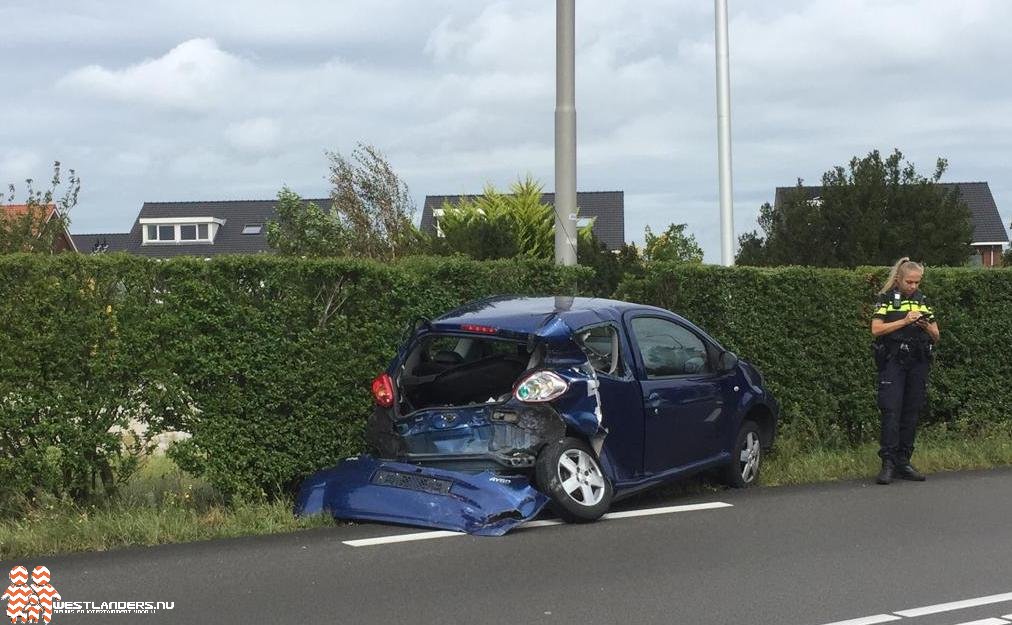 Automobilist gewond na botsing met bus 32