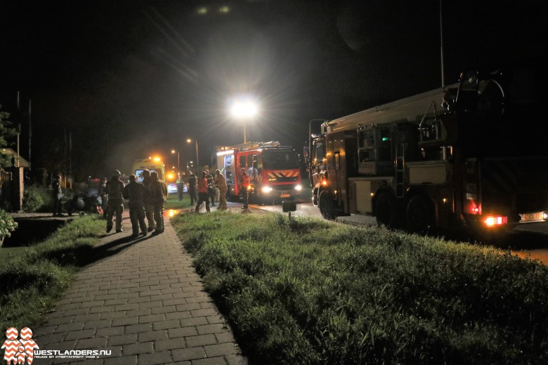 Fietser te water aan de Naaldwijkseweg