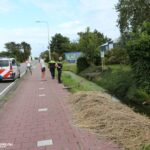 Fietser te water aan de Zwethlaan