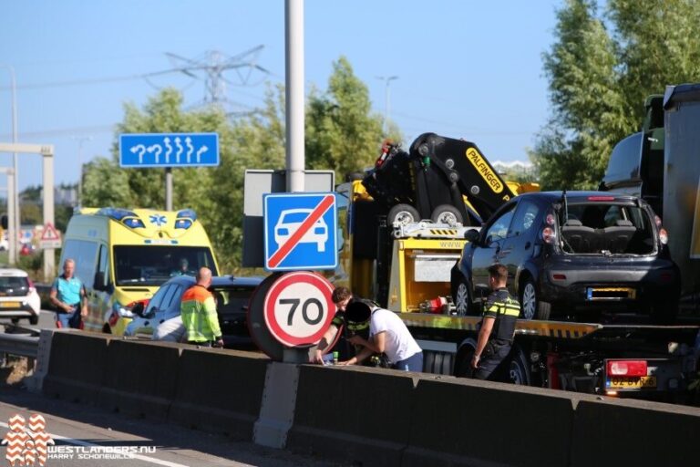 Toeristen wat later op het strand na ongeluk A20