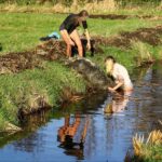 Dames in actie voor 15 schapen te water