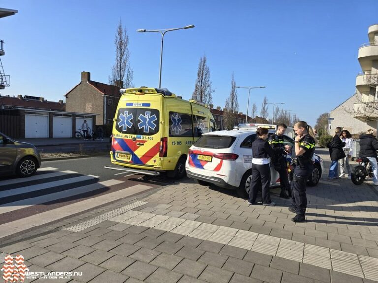 Fietsster over de kop na botsing met spanband